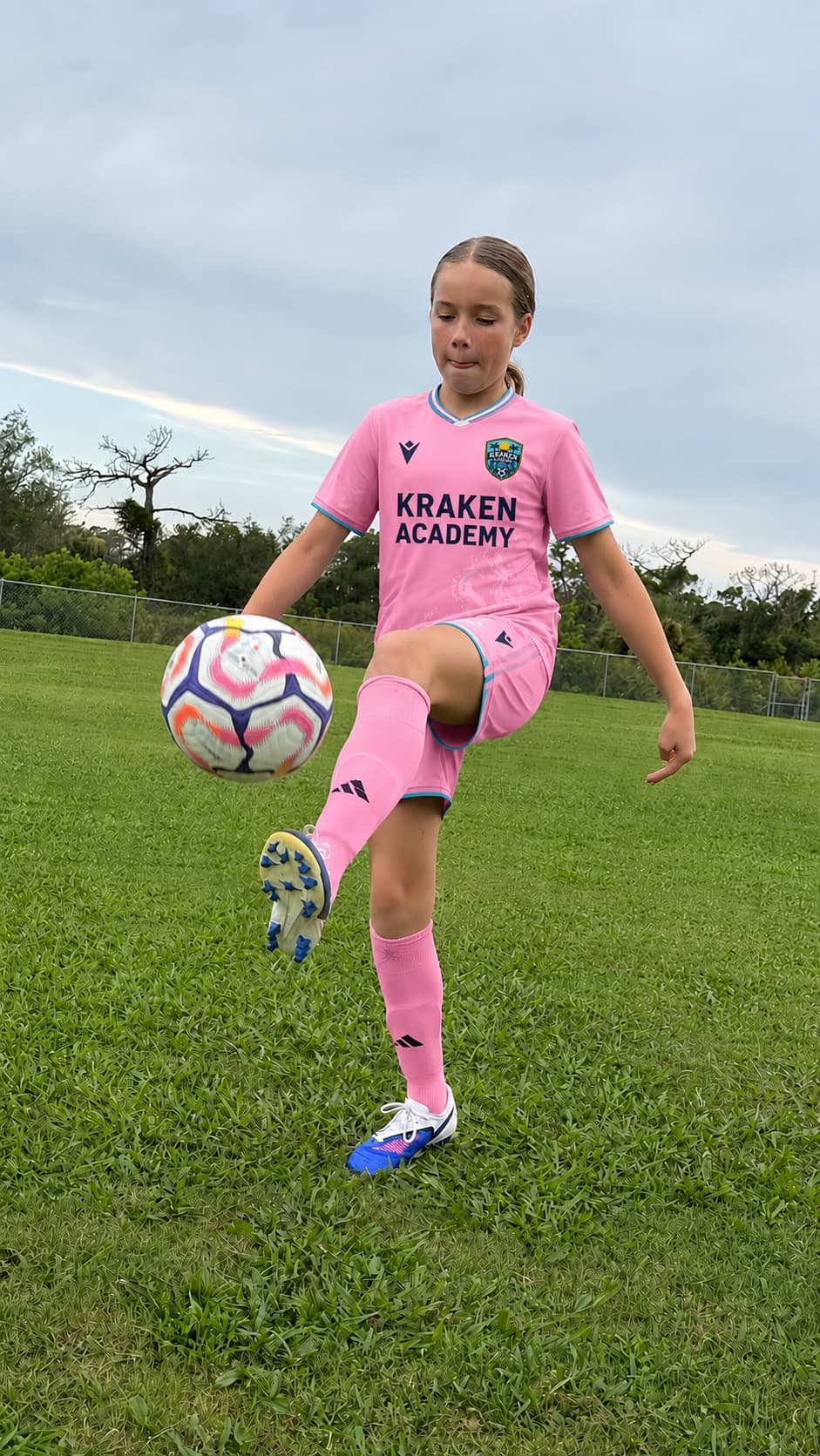 A Kraken Academy player controlling a ball on her thigh during training